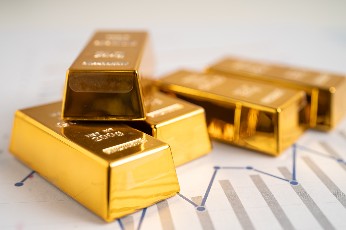 Gold bar on graph, economy finance exchange trade investment con